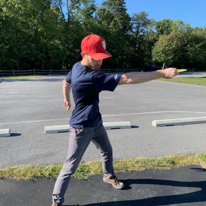 Backhand frisbee throw